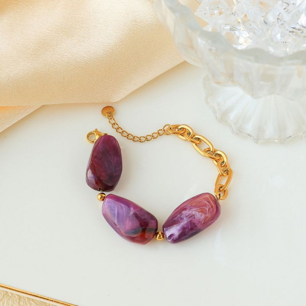 Браслет золотистый с крупными вставками под янтарь CJP93460