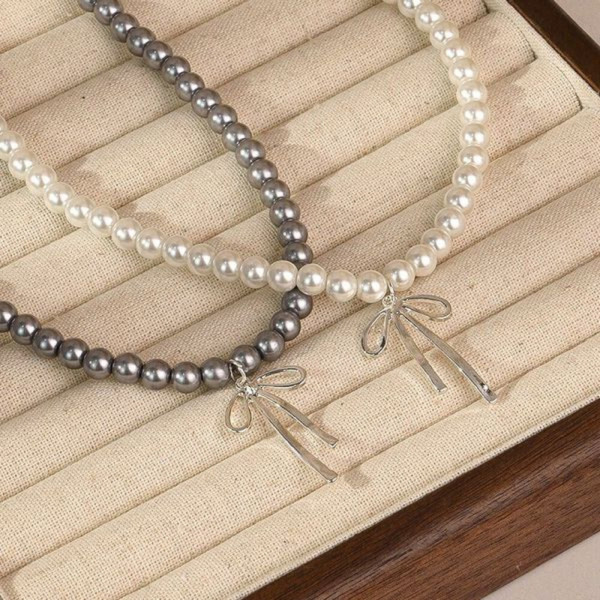 Изысканные бусы из жемчуга с декоративным бантом CJH38343