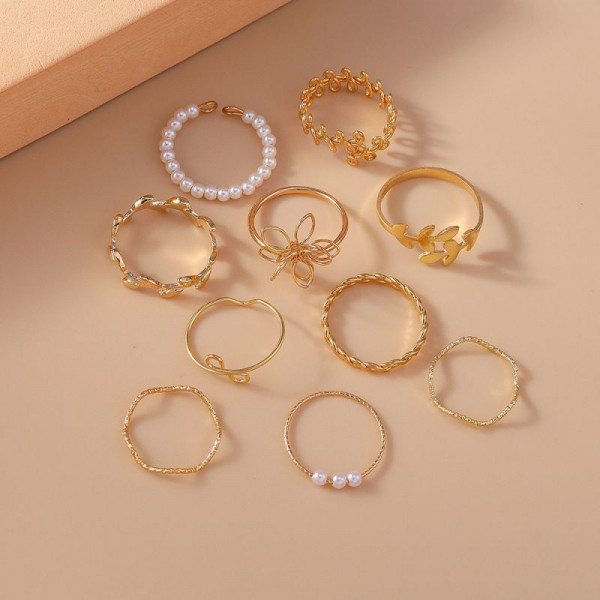 Большой набор золотистых колец с бусинами и звездами CJH74984