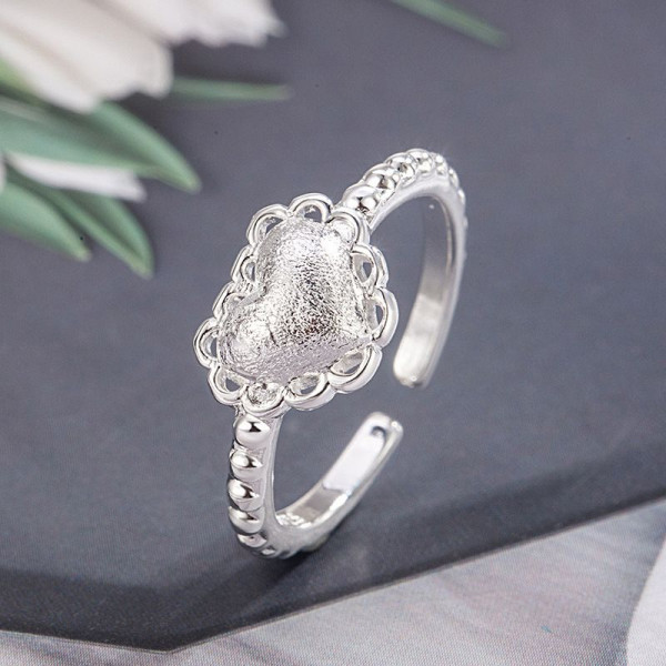 Кольцо с фактурным сердцем и жемчужным отливом 1J11924CJJ