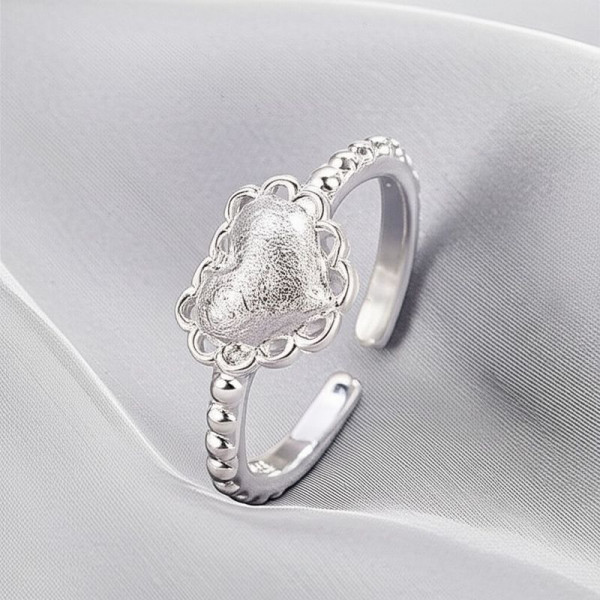 Кольцо с фактурным сердцем и жемчужным отливом 1J11924CJJ