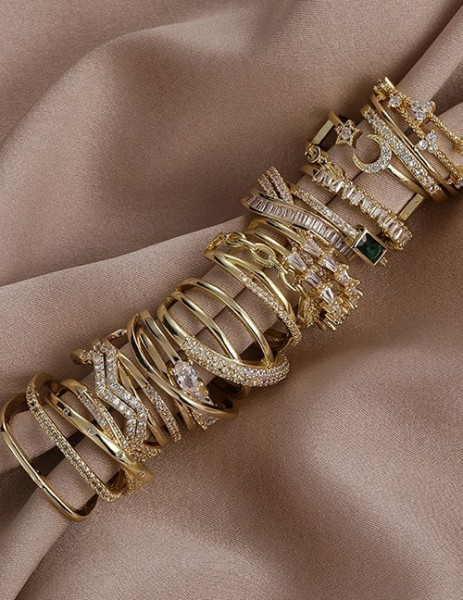 Двойное кольцо с дорожками из крупных кристаллов T94550