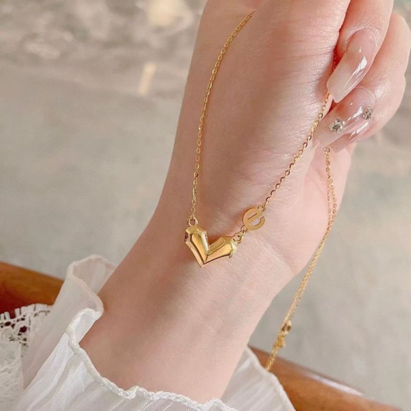 Золотистая цепочка с сердцем и буквой 1J11809CJJ