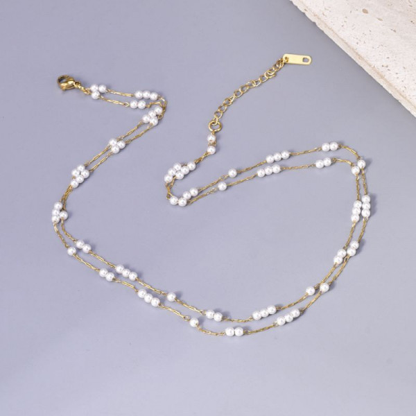 Двойная золотистая цепочка с кристальными вставками CJL14431