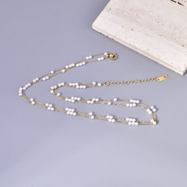 Двойная золотистая цепочка с кристальными вставками CJL14431