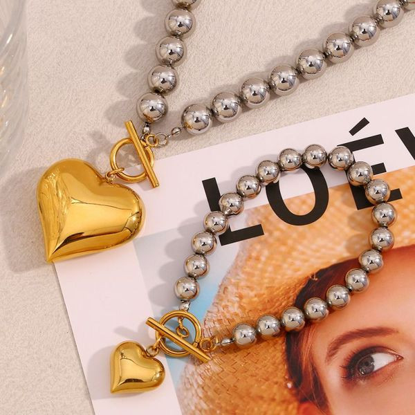 Браслет из жемчужных бусин с крупным сердцем-подвеской CJL49894