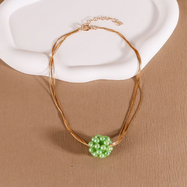 Золотистое колье из тонких цепей с красным шаром CJH43917