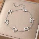 Браслет цепочка с подвесками в форме контуров сердец CJL77000