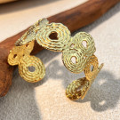 Браслет-кафф ажурный с круглыми элементами CJM18935