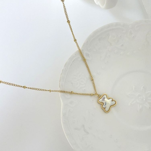 Золотистая цепочка с подвеской в форме медведя с перламутром J11284CJJ