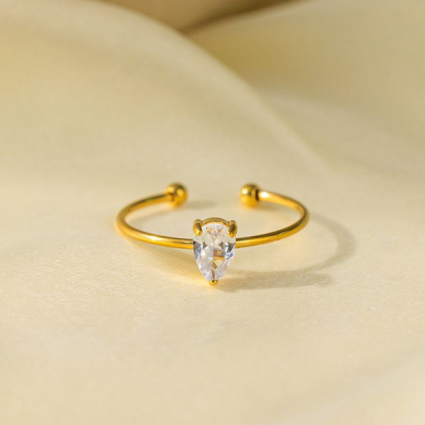 Золотистое разомкнутое кольцо с каплевидным кристаллом CJH15732