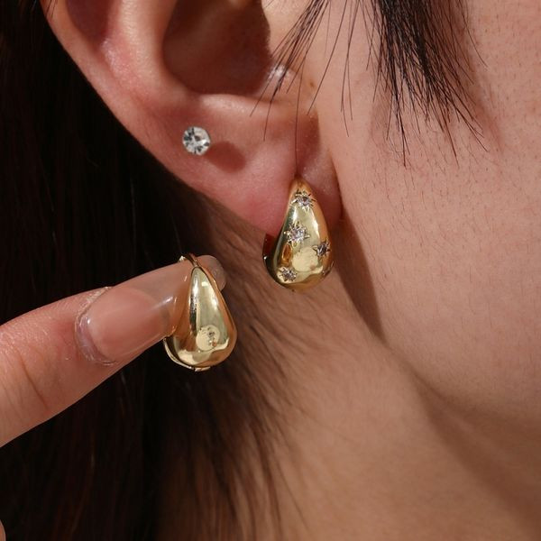 Объемные серьги-капли с гравировкой «звезды» CJL53922