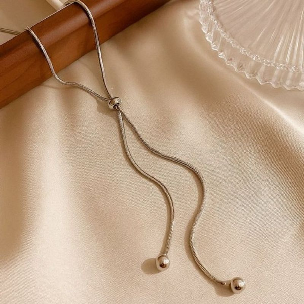 Титановое колье-галстук с шариками-бегунками 1J12228CJJ