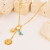 Золотистая цепь с бирюзовыми камнями и овальным медальоном CJR55563