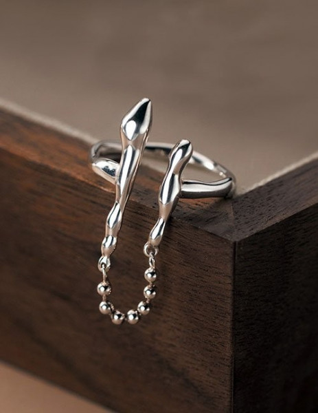 Кольцо на весь палец в виде абстрактных линий с цепочкой L82119