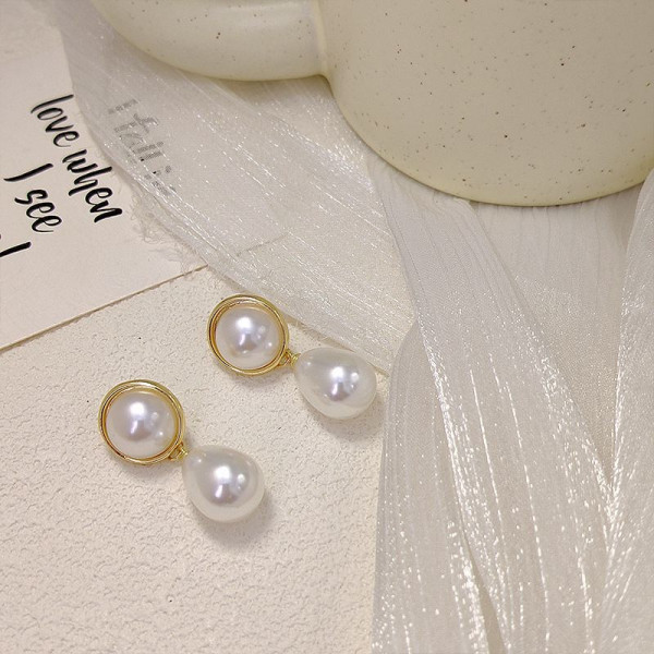 Серьги пусеты с крупными барочными жемчужинами в оправе CJD60456