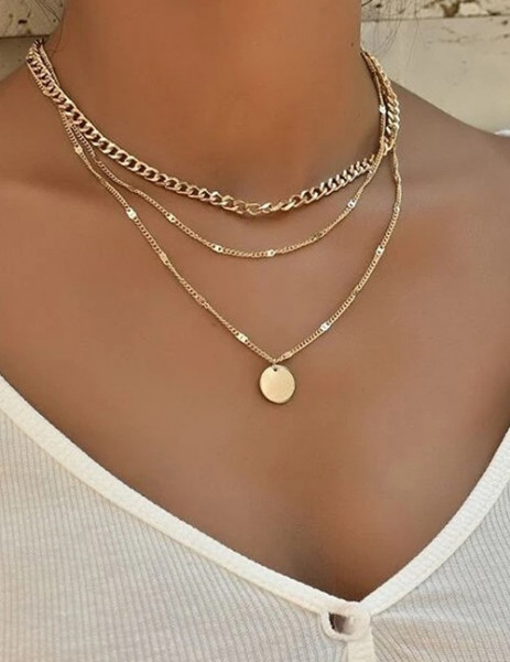 Многослойное колье из золотистых цепей с медальоном Q51975MSK