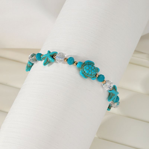 Браслет из голубых камней с черепахой CJP43689