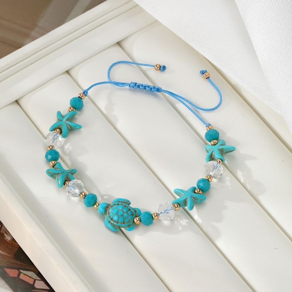 Браслет из голубых камней с черепахой CJP43689