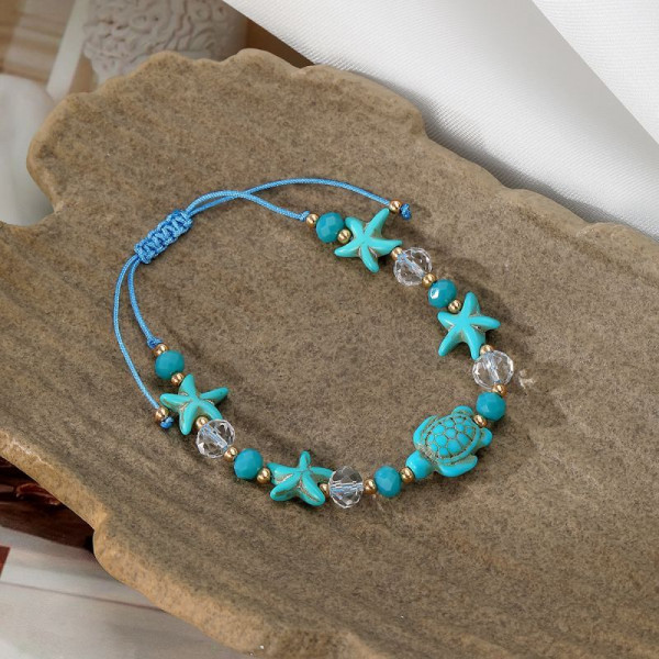 Браслет из голубых камней с черепахой CJP43689