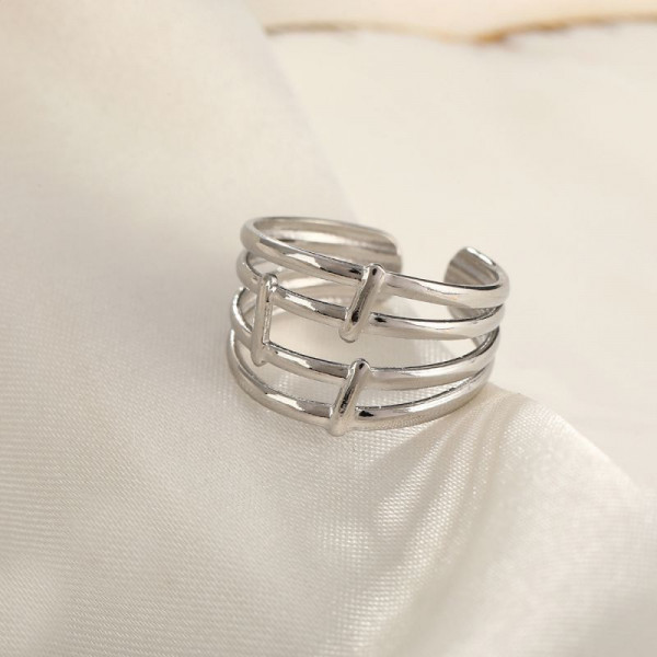 Многослойное кольцо из тонких золотистых линий CJH27685